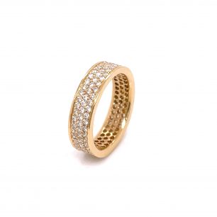 Yellow gold band ring adorned with diamonds. The object is set on white background.